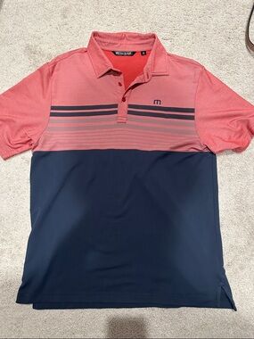 Travis Mathew Coral and Navy Striped Golf Polo